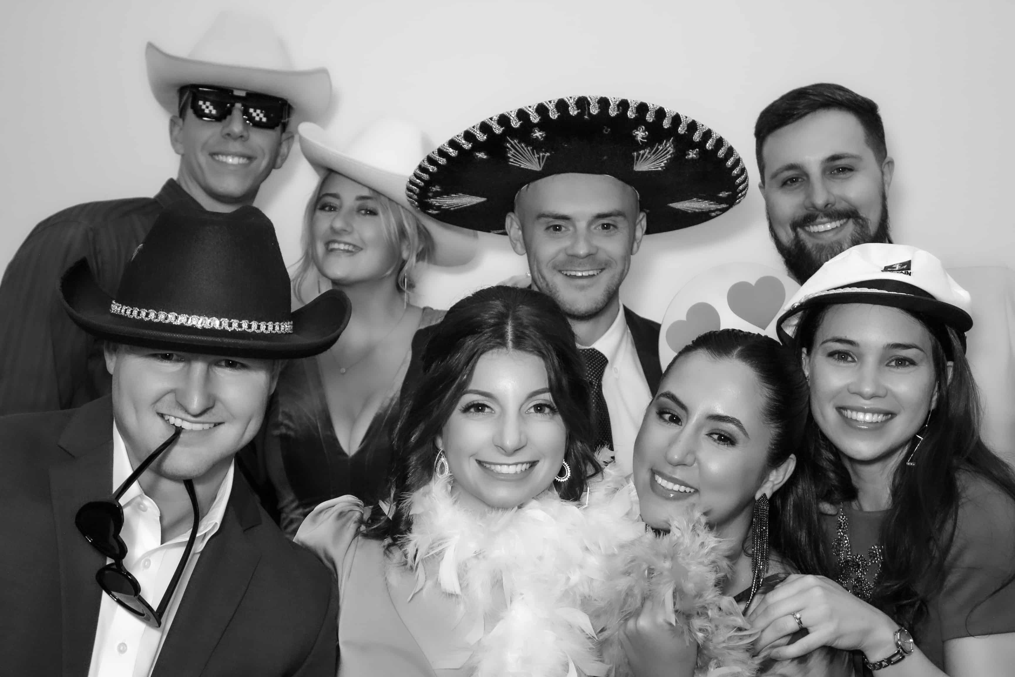 Large group enjoying a black and white photo booth portrait